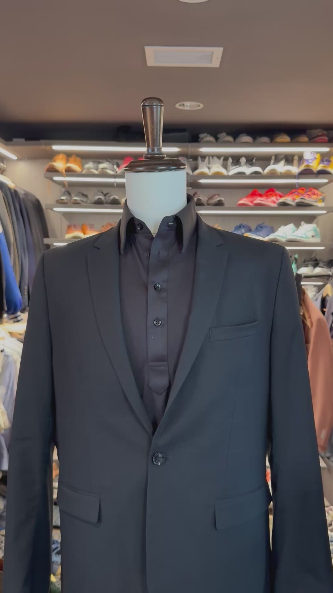 Grey Cloud 9 silk pocket square sliding into suit pocket — no folding required, permanently sewn puff fold by Stacy Claude Design