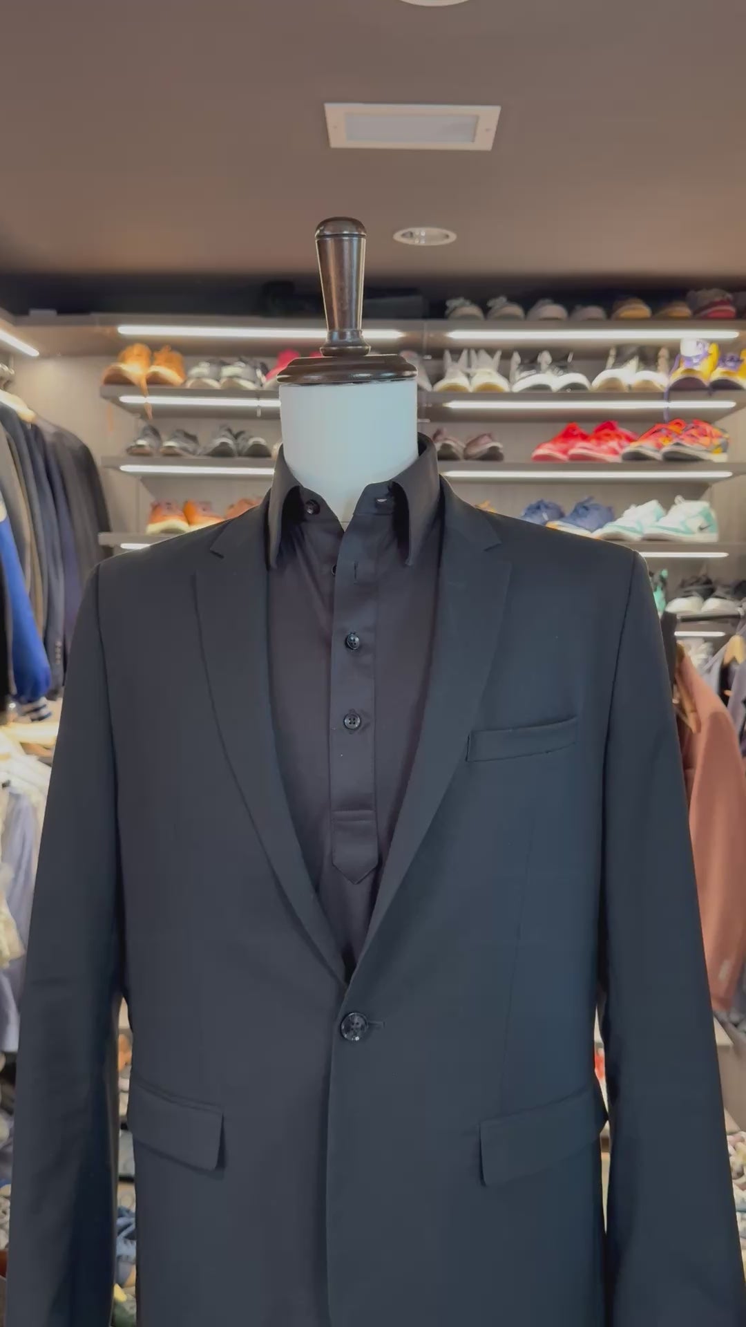 Grey Magic silk pocket square sliding into suit pocket — no folding required, permanently sewn signature fold by Stacy Claude Design